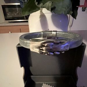 COPY - And human hand holding a dog paw Bracelet